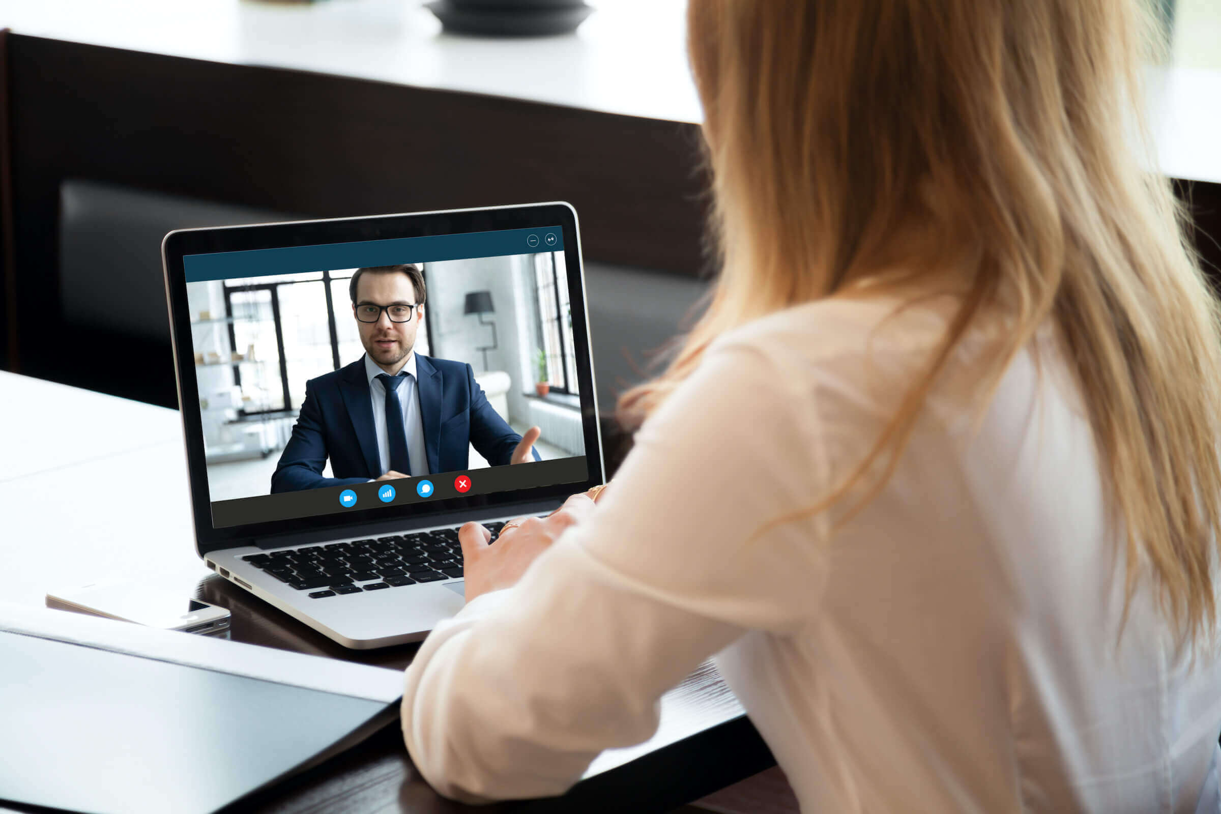 woman getting skype interview tips through video call